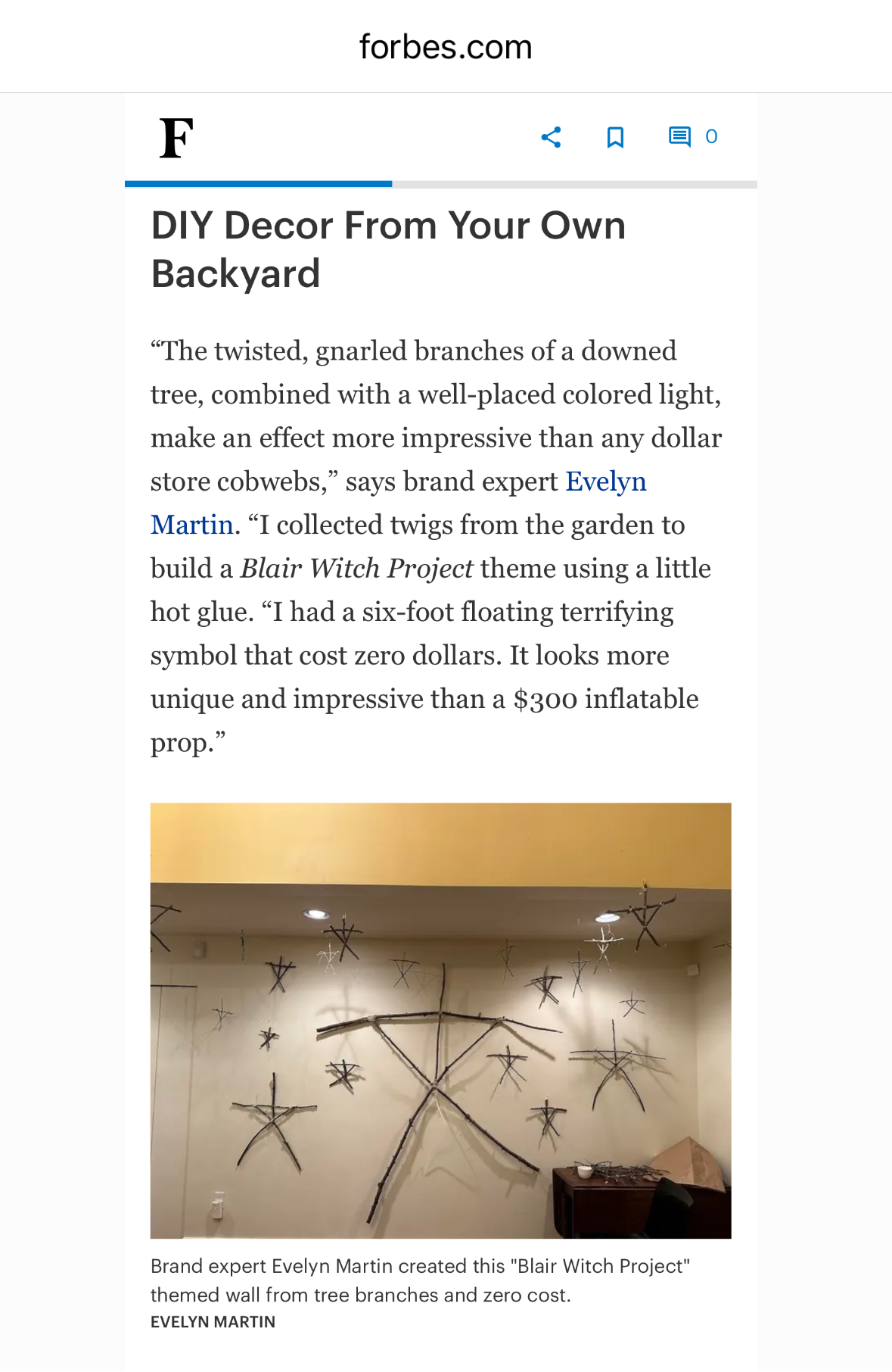 Screen shot of a Forbes article on DIY decor with a wall art image.