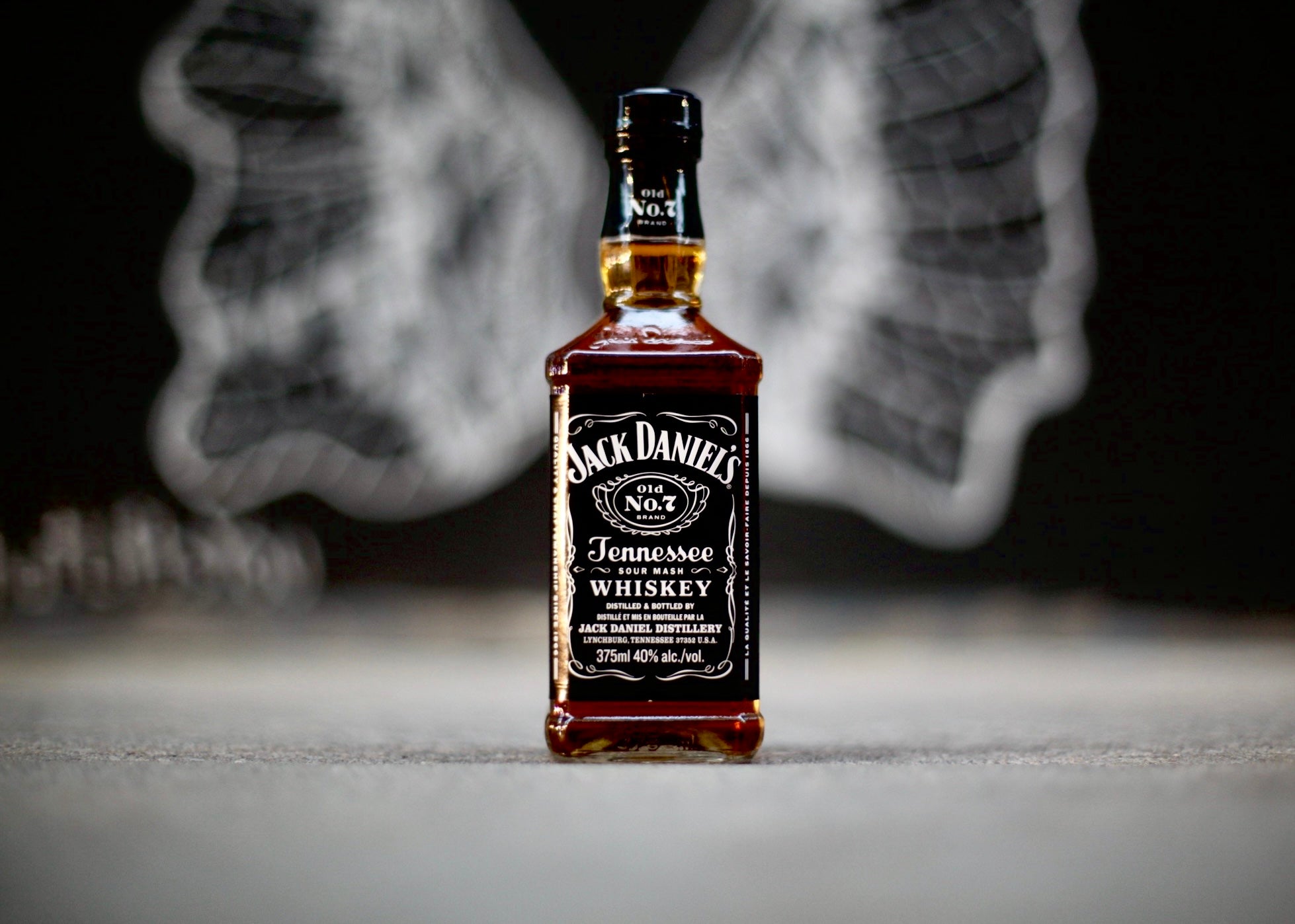 Jack Daniel's Tennessee Whiskey bottle with a blurred background